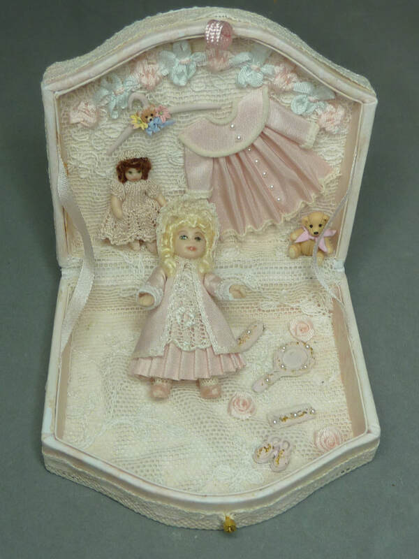 Doll in a trunk